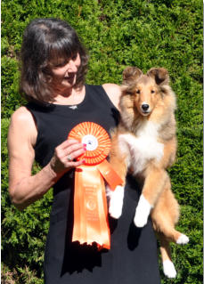 Tanner at 5 1/2 months with his proud mom after his first show,  as a BABY PUPPY